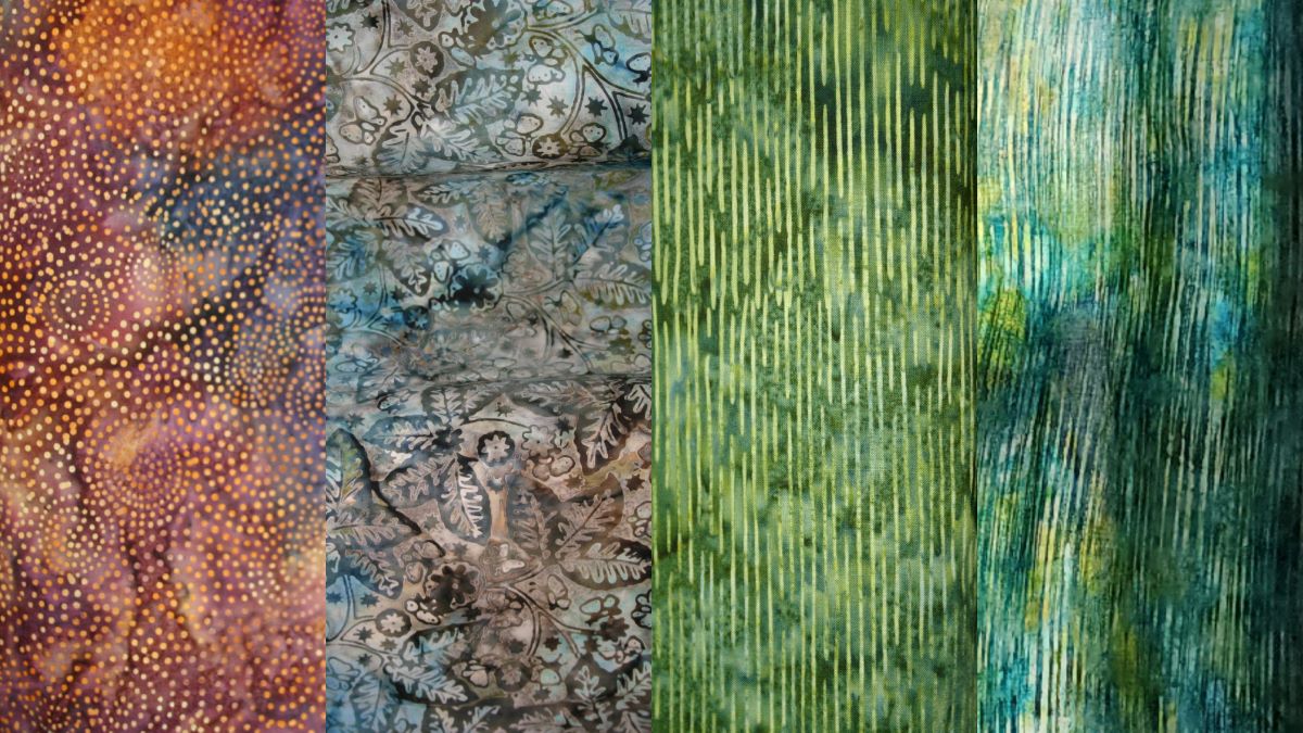 A collage of four different batik fabrics, one with orange and purple swirls, one with blue and brown flowers and leaves, one with green vertical stripes, and one blue and green with wavy vertical stripes.