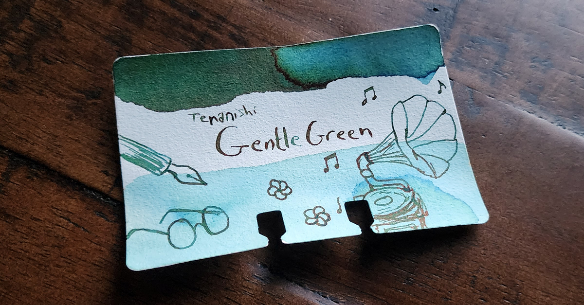 A Col-o-dex card with a swatch and sketches of a phonograph, glasses, and fountain pen nib matching the box art for Teranishi Gentle Green.