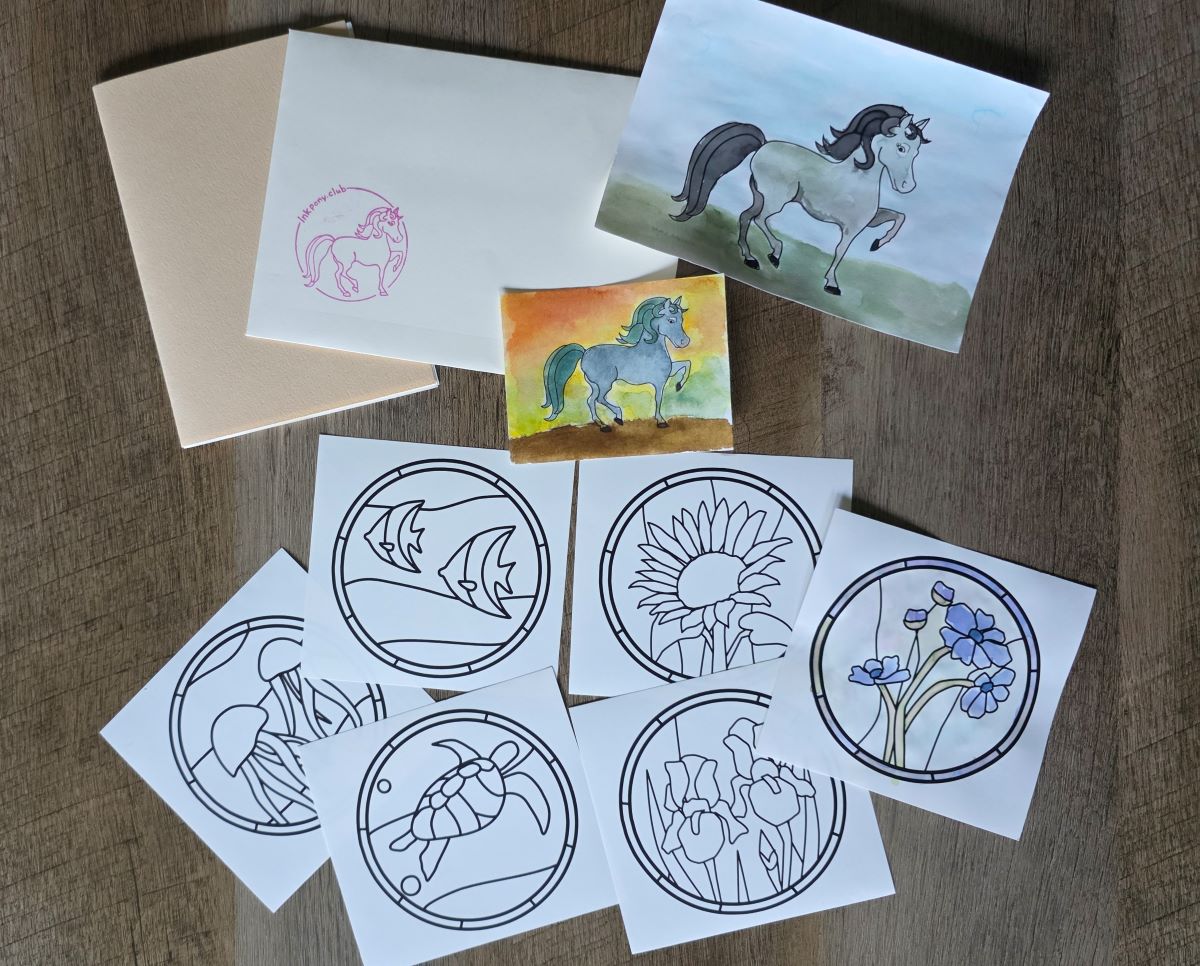 Small A6 booklet, Ink Pony Club envelope and painted ponies, small square papers with stained glass sea creature and floral designs including one that's painted with fountain pen ink.