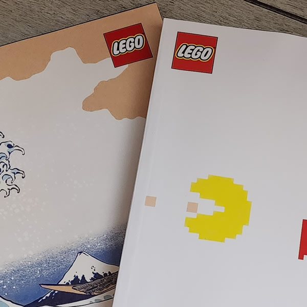 Lego instruction booklets for Hokusai - The Great Wave and PAC-MAN Lego kits